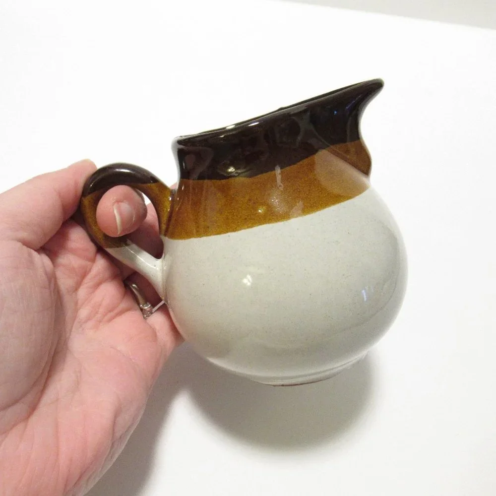 Brown and White Ceramic Serveware Pitcher